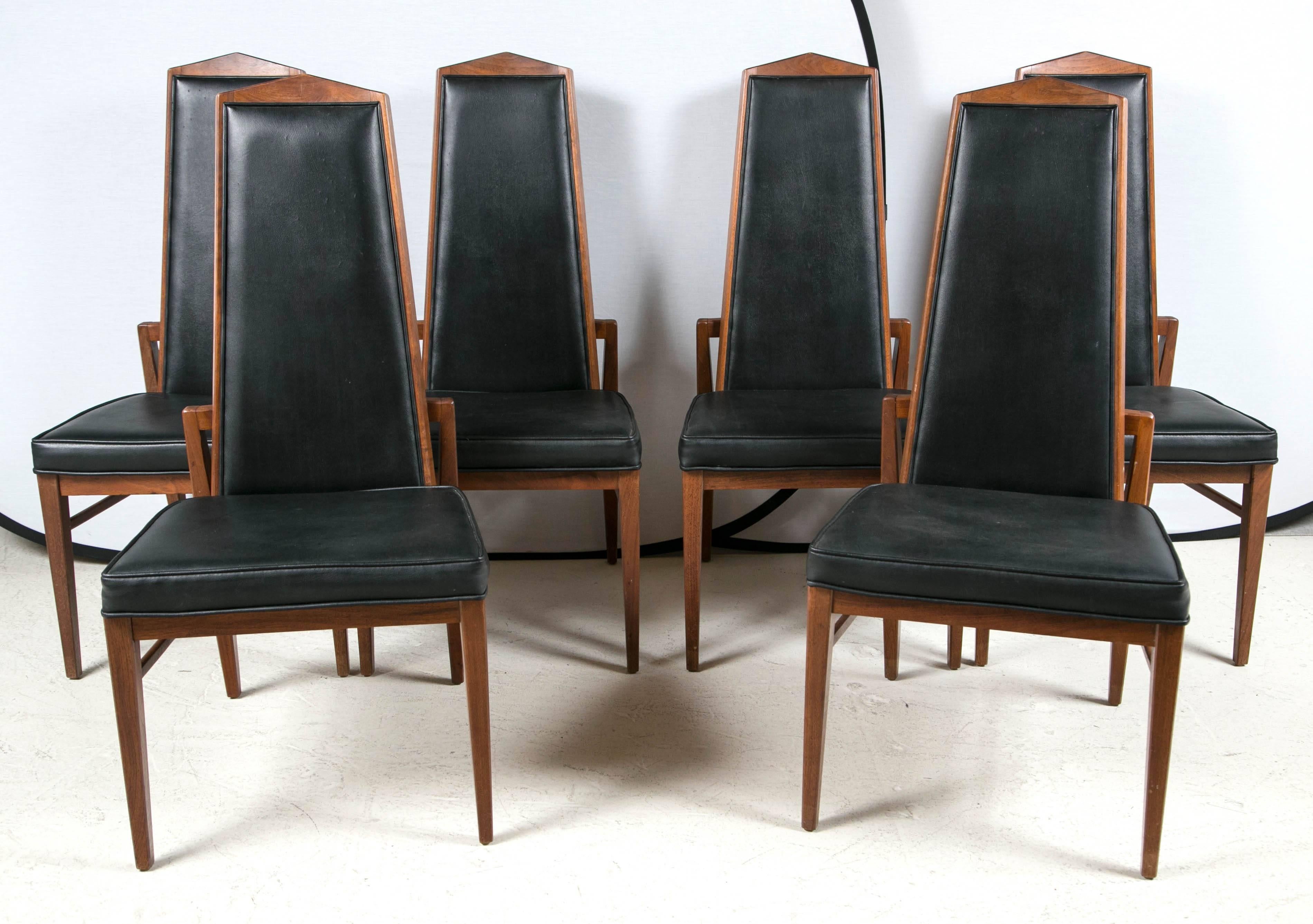 A set of six Foster & McDavid dining chairs, walnut, circa 1960s.
Founded in Florida in 1950s. Seats are faux leather.