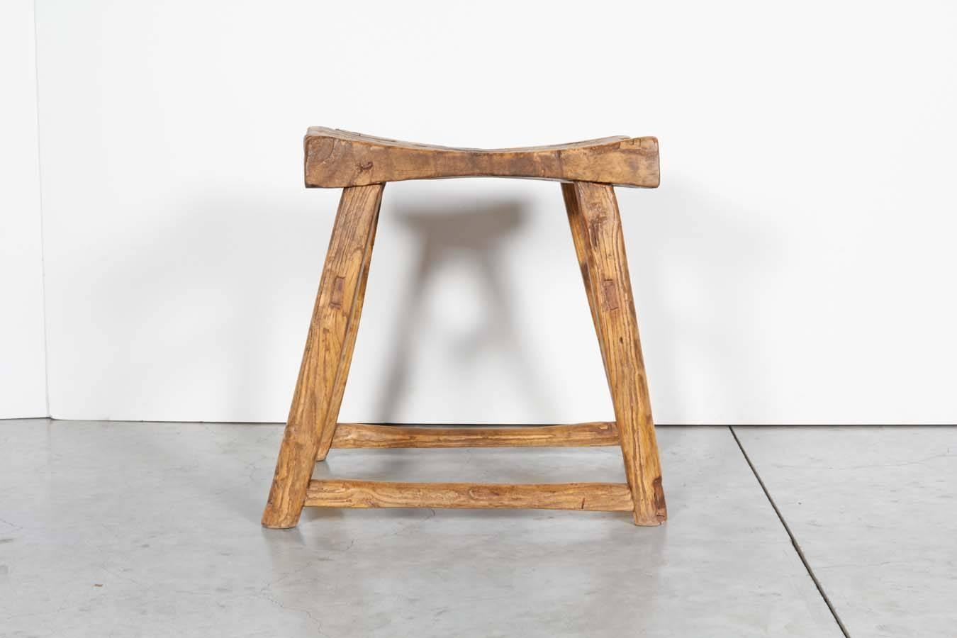 A beautifully worn, textured and patinated antique Chinese elm stool from Shanxi Province.
A striking design statement and a piece of history.
S440.