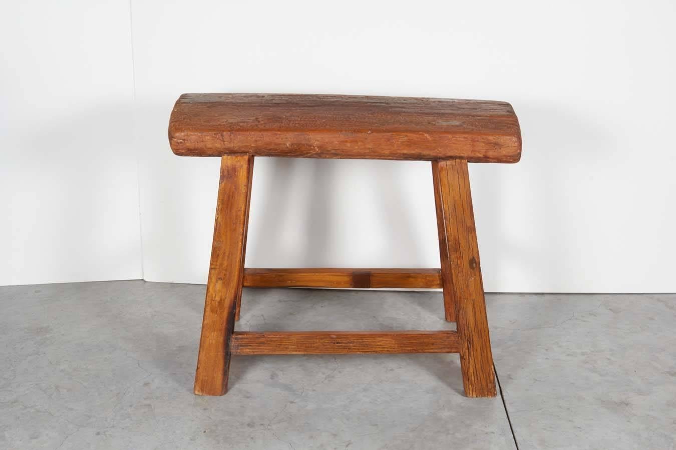 An unusually large antique Chinese stool/ bench with thick elm seat and beautiful, dark patina. Great entry piece with real presence. from Shanxi Province, circa 1900.
S478.