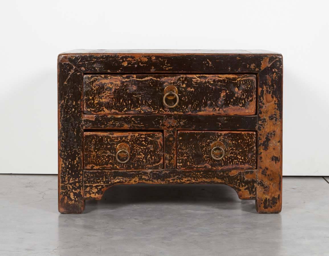 A nicely worn three drawer antique Chinese Kang table with traces of original lacquer. Works great as a side table, or low nightstand. From Shanxi Province, circa 1900.
CT420.