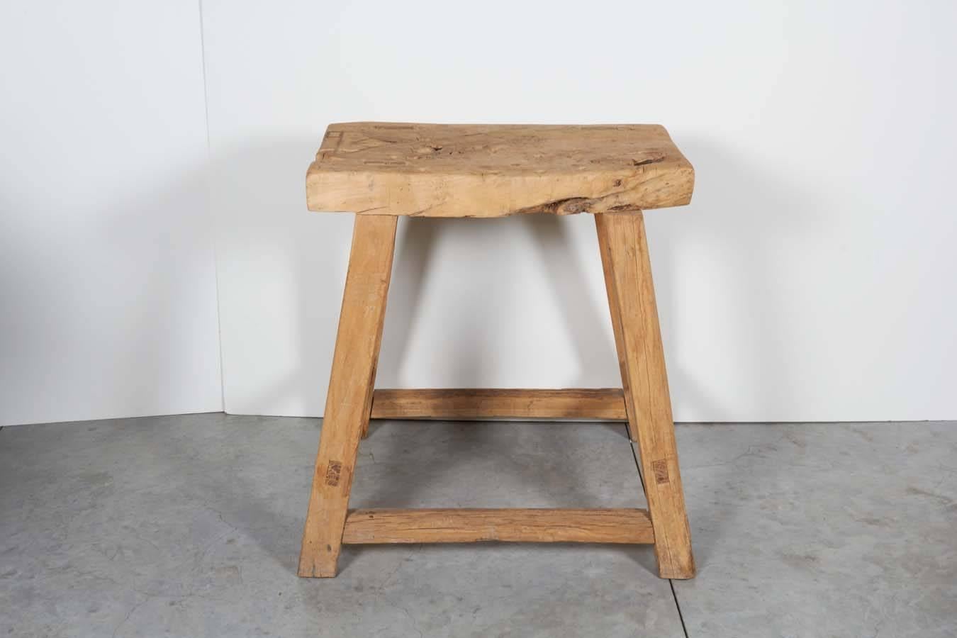 A beautifully worn work table in light colored elm. This piece has a very thick top with evidence of decades of use. From Shanxi Province, circa 1900.
S519.