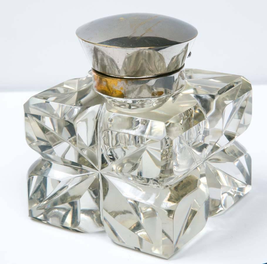 This is just one piece from a large collection we acquired of 18th-19th century antiques from a private collector. This beautiful inkwell has a starburst pattern. Sterling silver collar and top. Size: 4