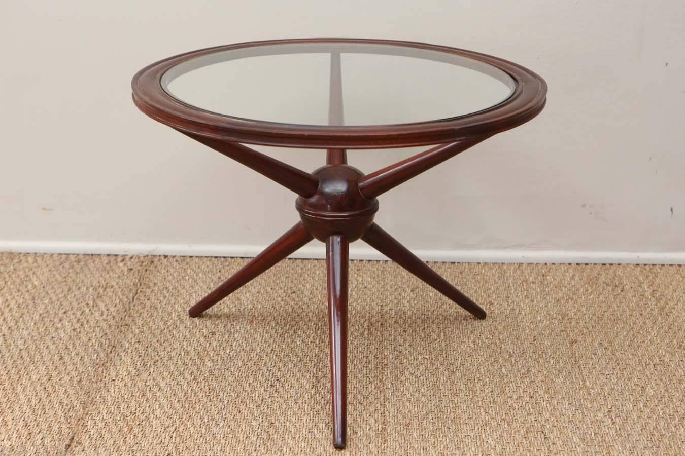 Wooden side table with glass inset top.