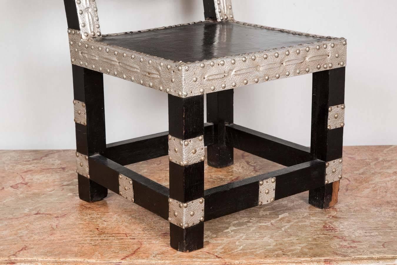 Ghanaian Early 20th Century Ebonized and Silvered Hall Chair