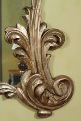 An Exuberant Carved and Silver Gilt Italian Mirror, provenance: Tony Duquette
