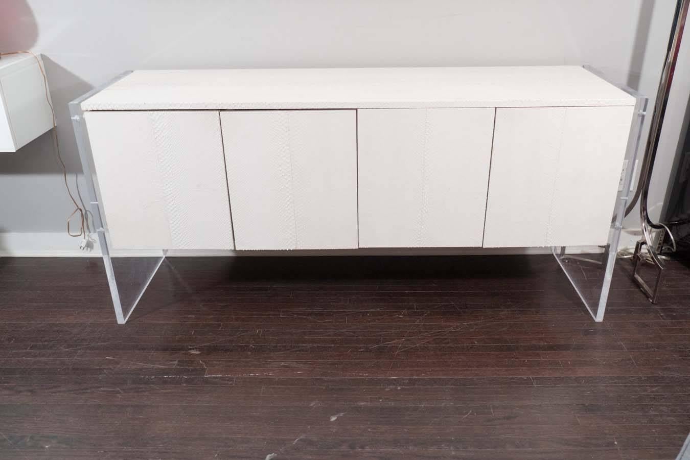 Custom white python sideboard with Lucite side panels. Customization available in different sizes.