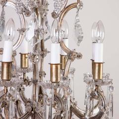 A Marie Thérèse 8 light chandelier, from the Tivoli gardens.