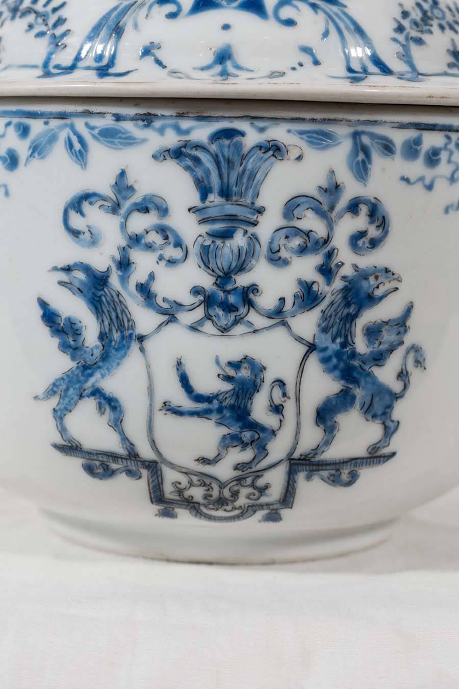  Chinese Blue and White covered jar decorated in rare overglaze blue enamels with a coat of arms. The arms feature a lion rampant with griffin supporters, and a crest of three ostrich feathers coming out of a crest coronet. Most likely these arms