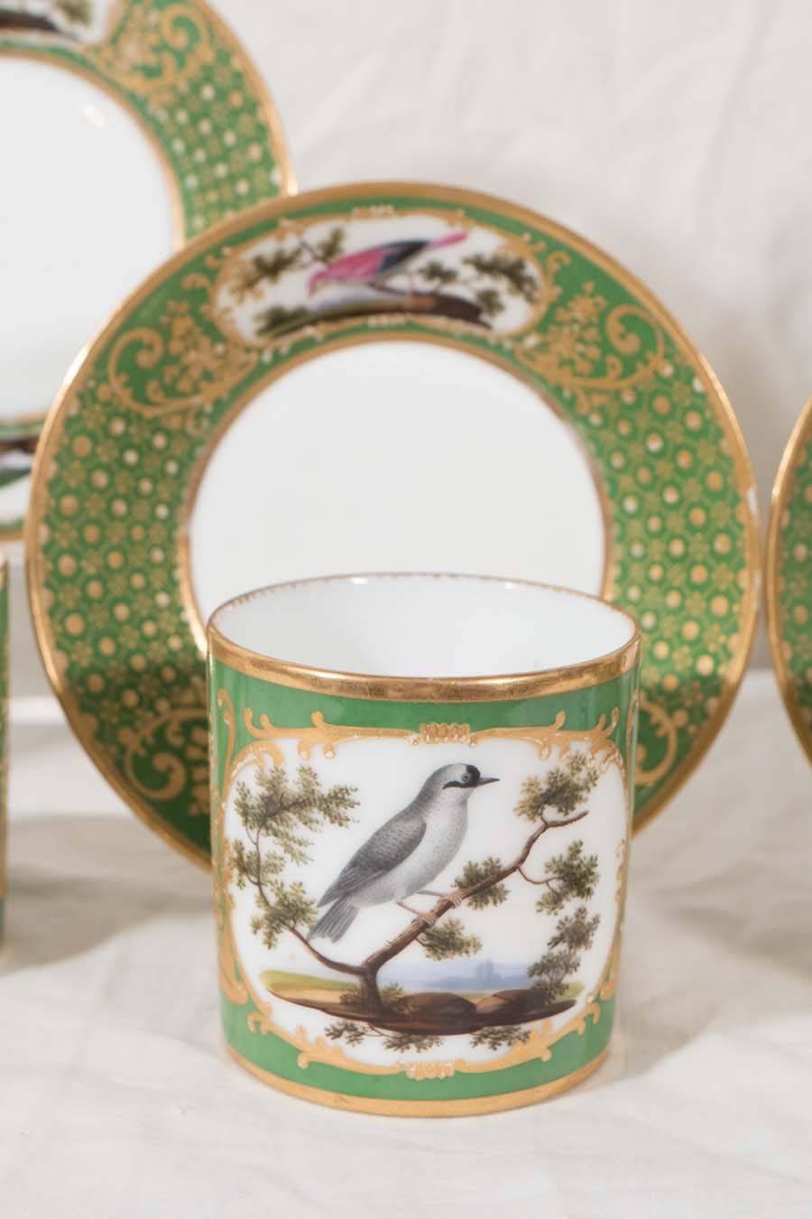 These cups are of the highest quality. Each is beautifully hand-painted by Feuillet showing an individual bird lighting on a branch. The green ground has exceptional gilding particularly surrounding the handle (see image #7).
Marked on the bottom