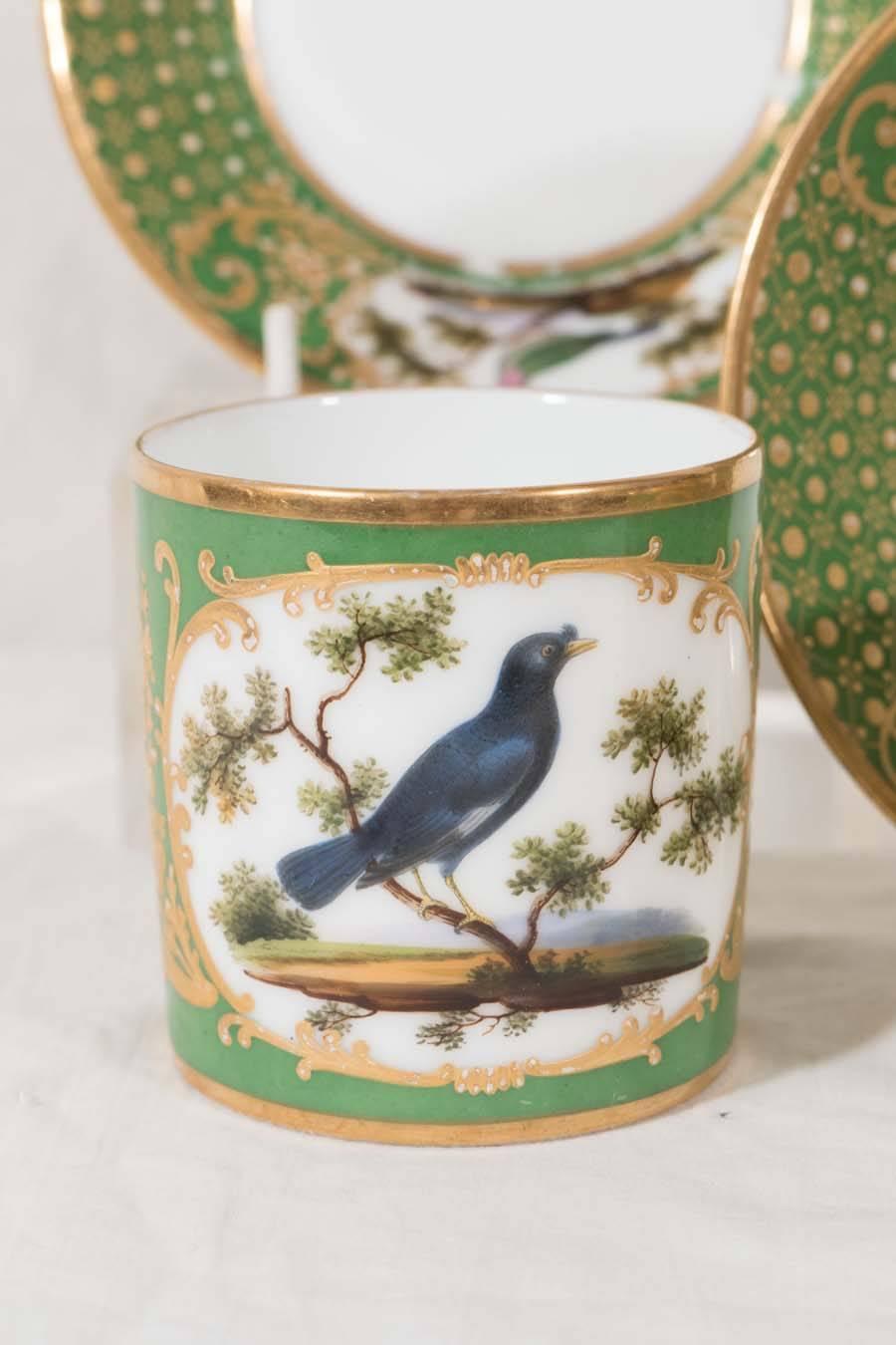 Louis Philippe Four Paris Porcelain Coffee Cans with Hand-Painted Birds on a French Green Groun