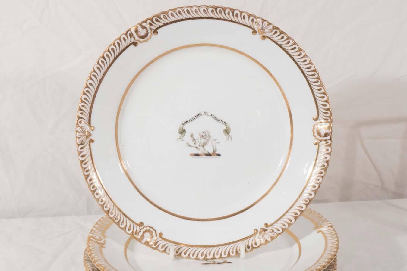 English A Pair of Armorial Porcelain Plates in White and Gold