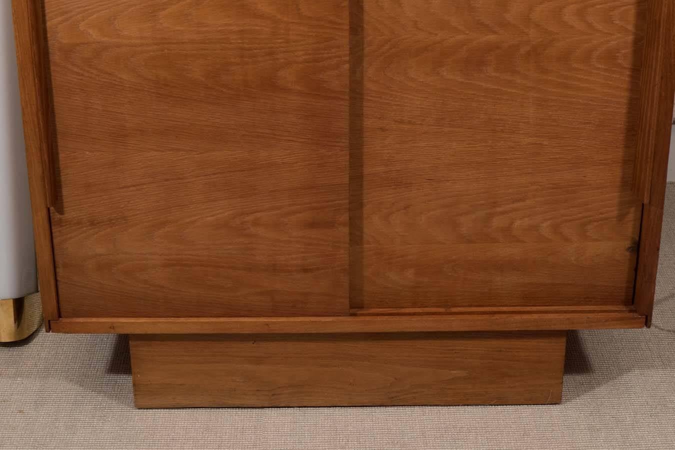French oak and elm cabinet, France, circa 1945.