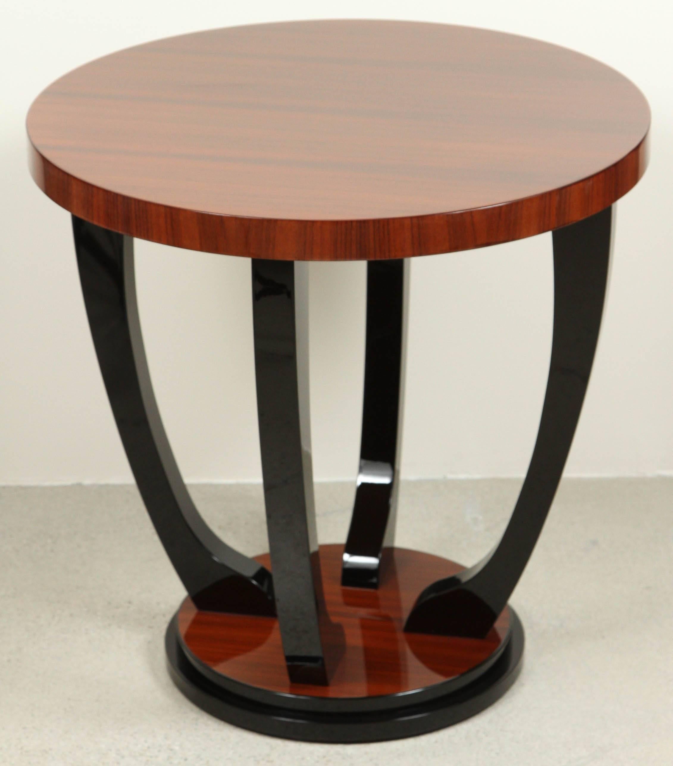 Art deco style side table made of fine rosewood and black lacquer accents by German Fine furniture maker Cygal art deco.
A clean and decorative table, this piece has become one of our classics.
Other finishes available.