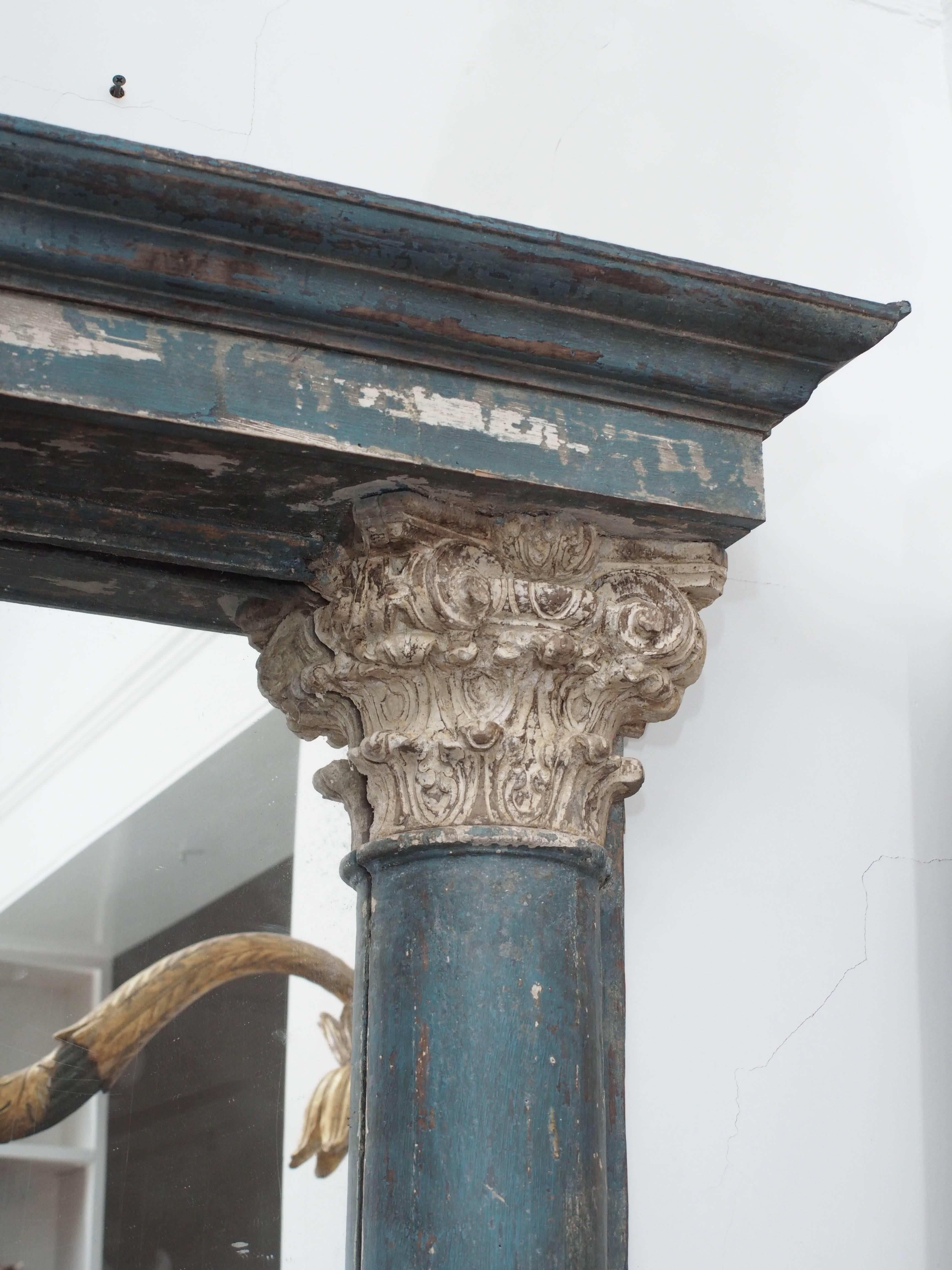 18th century carved wood column mirrors with Corinthian capitals from Portugal.