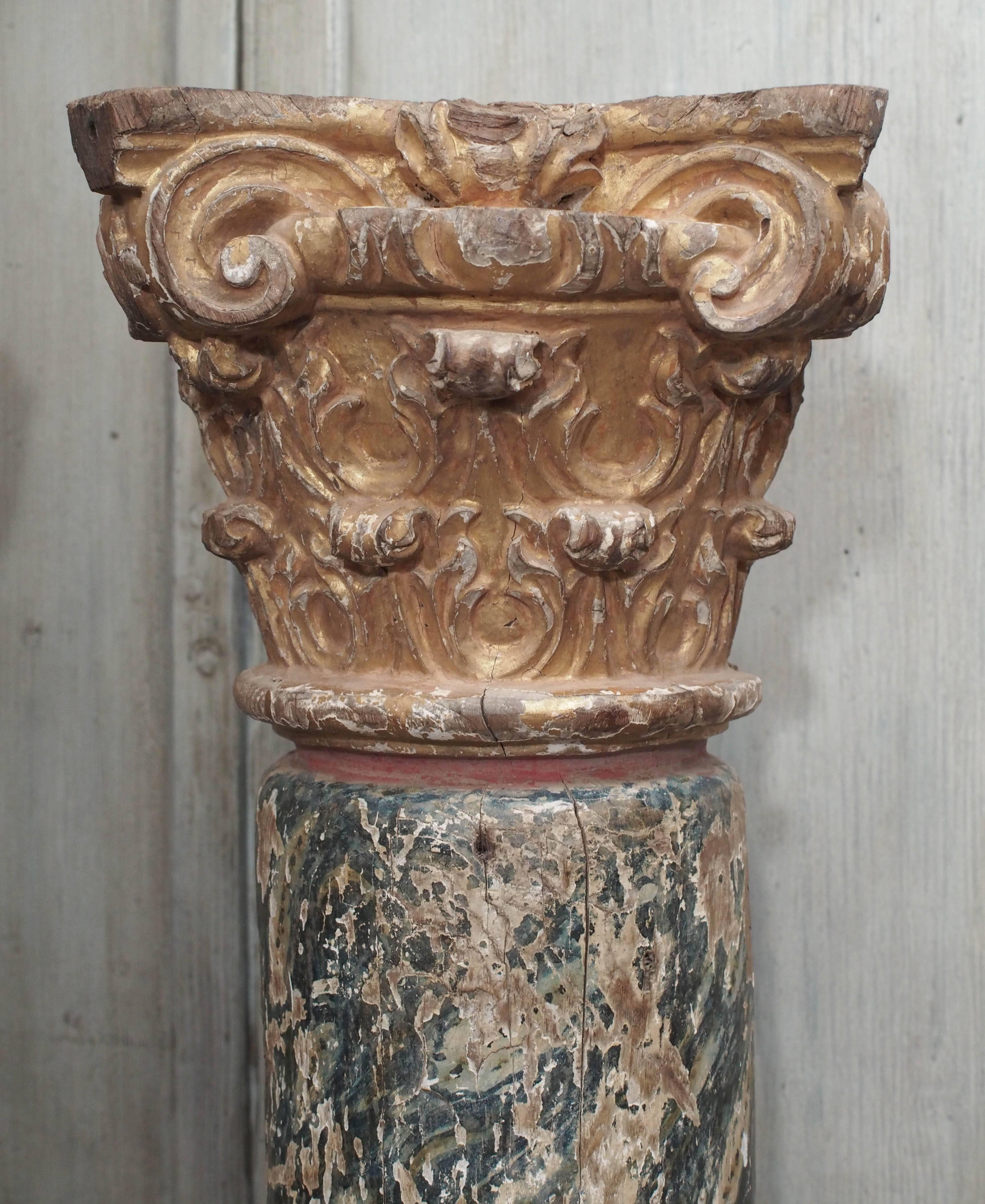 17th century hand-carved, painted wooden columns. Dimensions are as follows: 62” H x 9” W at the cap (widest point).

The columns have a circumference of 26”.
 