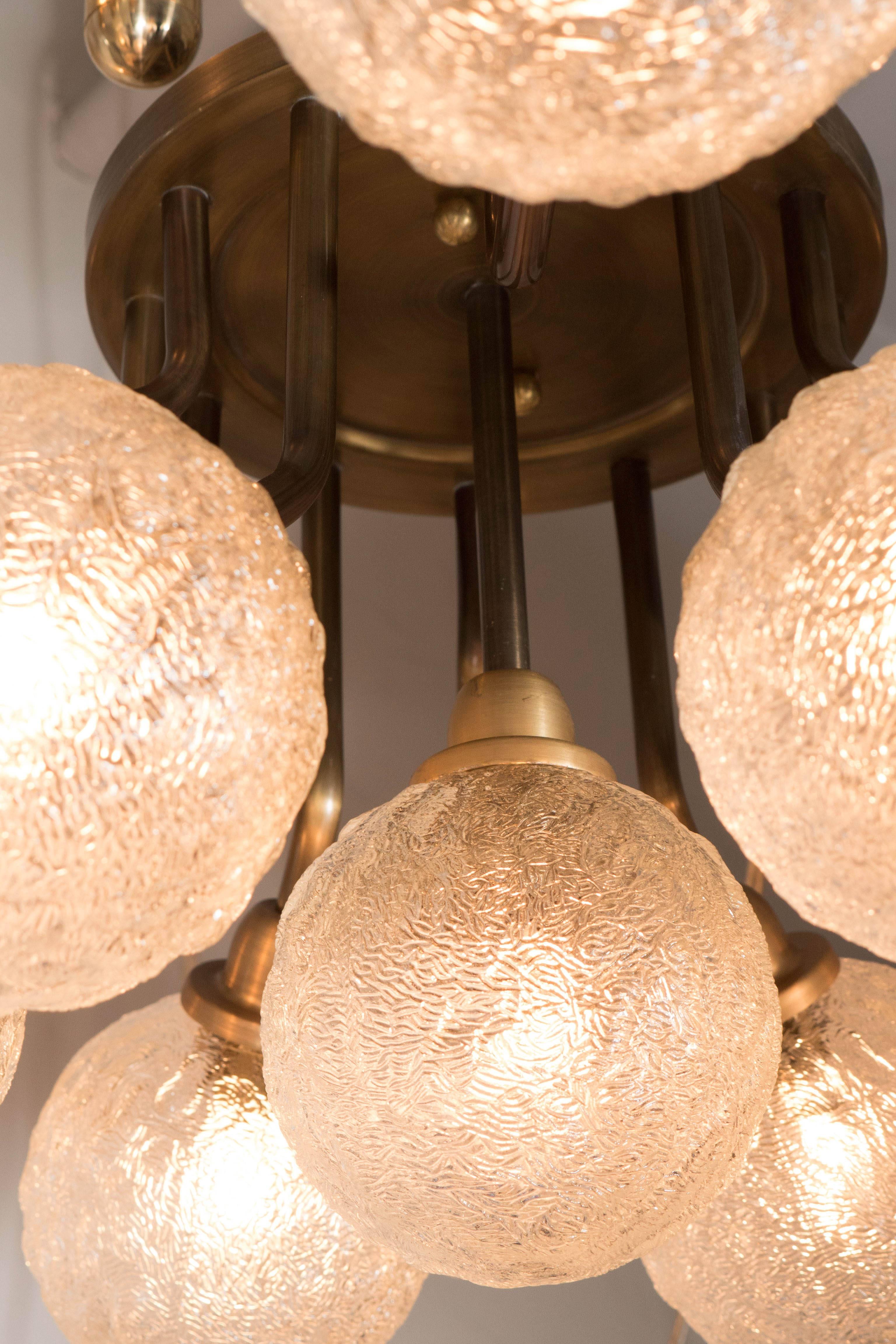 Mid-20th Century Mid-Century Patinated Twelve Arm Brass Flush Mount Chandelier w/ Textured Globes