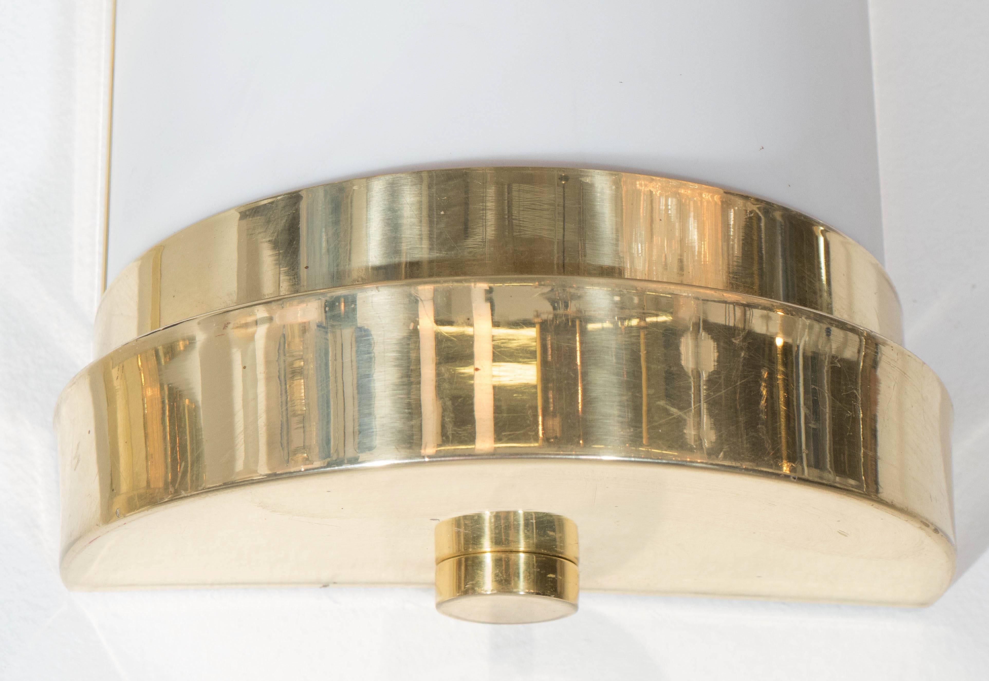 Plated Pair of Cylindrical Wall Sconces in Frosted Acrylic and Brass For Sale