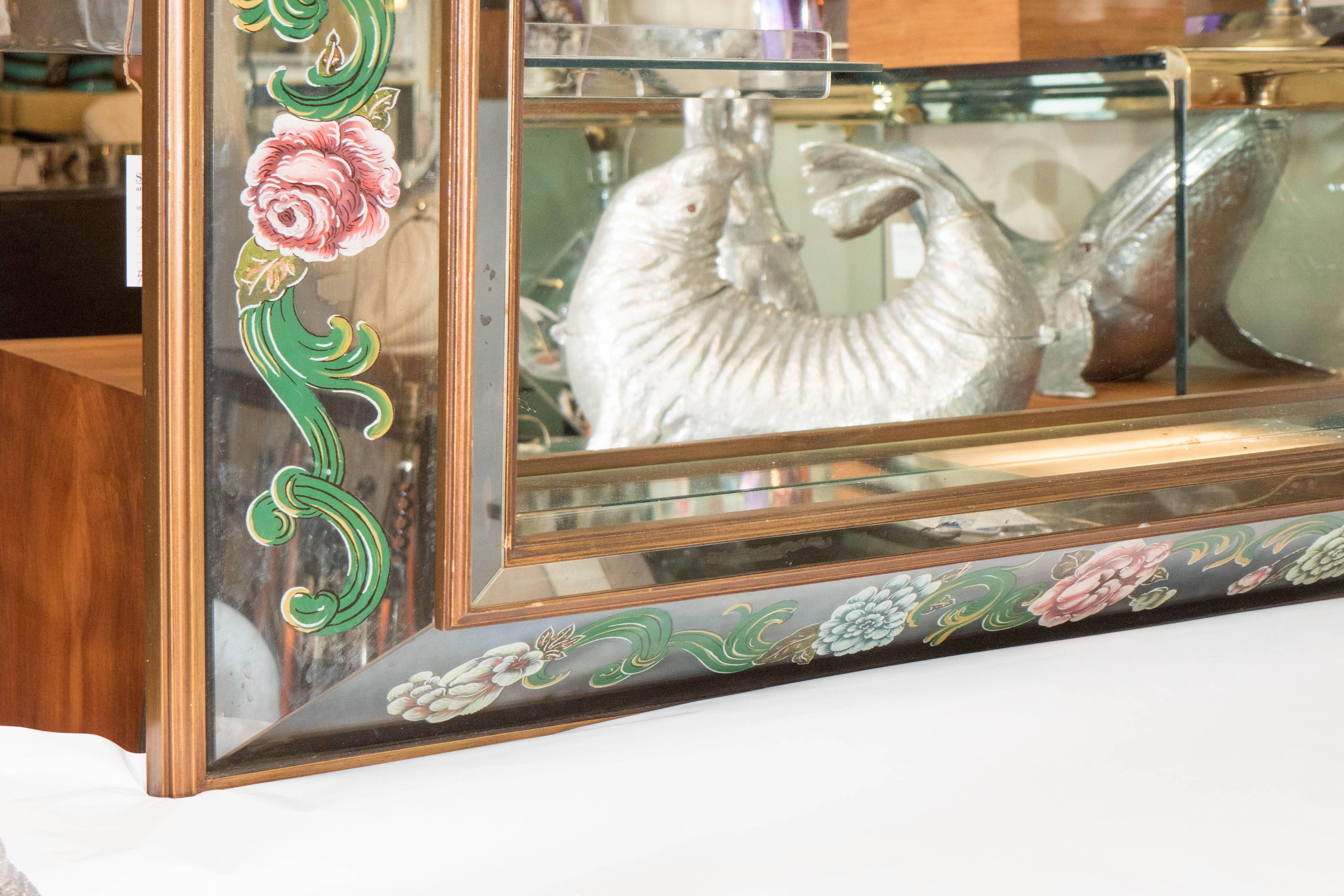 glass shelves on mirrored wall