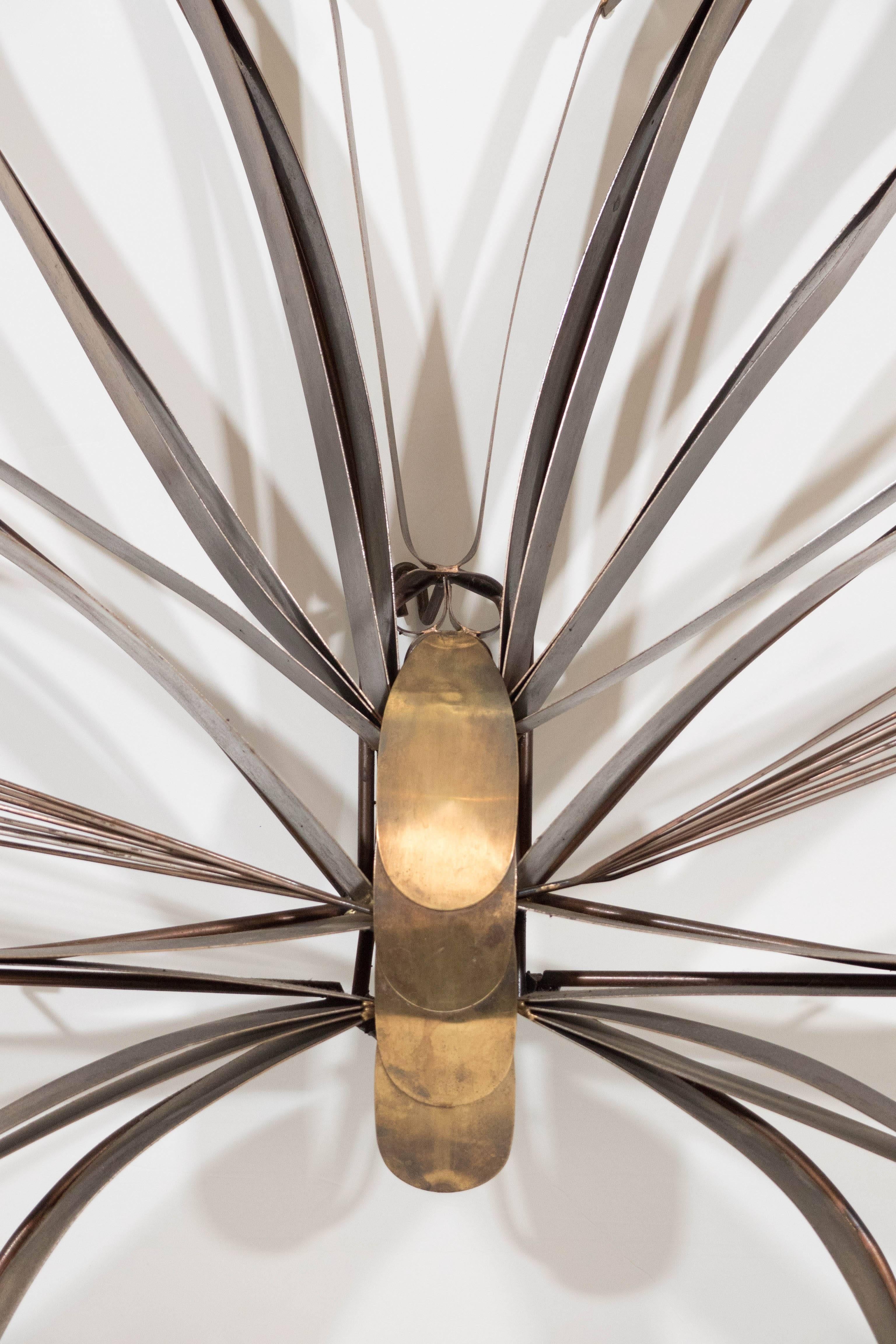 This Curtis Jere Brutalist wall sculpture comes in sheets of patinated brass, soldered and formed into the shape of a butterfly. Markings include [©C. Jere/ 1978] to one of the wings. This piece remains in good vintage condition, consistent with age.
