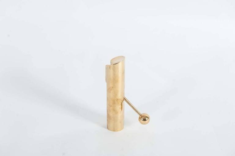 Very refined adjustable candle holder designed by Pierre Forsell for Skultuna.
It is made of brass and was made in the 1950s.
     