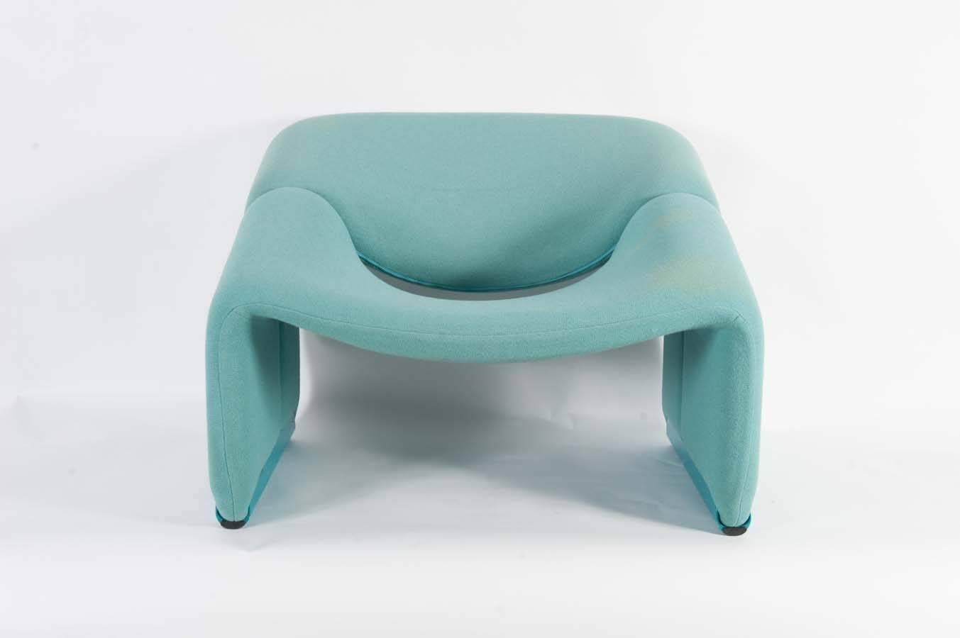 The Groovy Chair is one of the most enigmatic chairs by French star designer Pierre Paulin. It dates form 1972.

This pair still has its original mint green upholstery, with the base in a matching green.