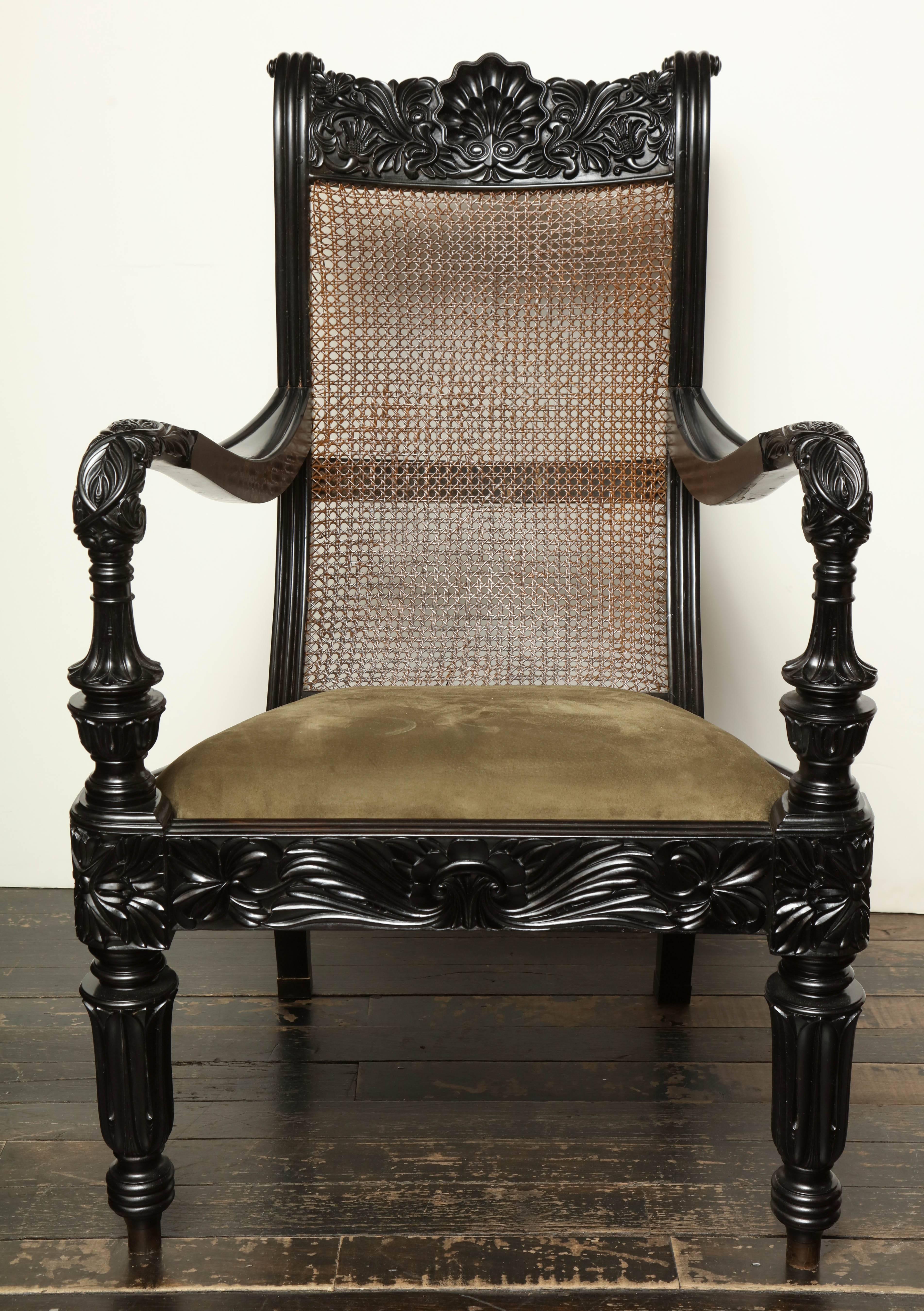 Pair of Raj, hardwood, cane back Planters chairs, circa 1830.