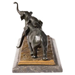 Art Deco-Style American Cast Metal Marble Sculpture of Three Marching Elephants