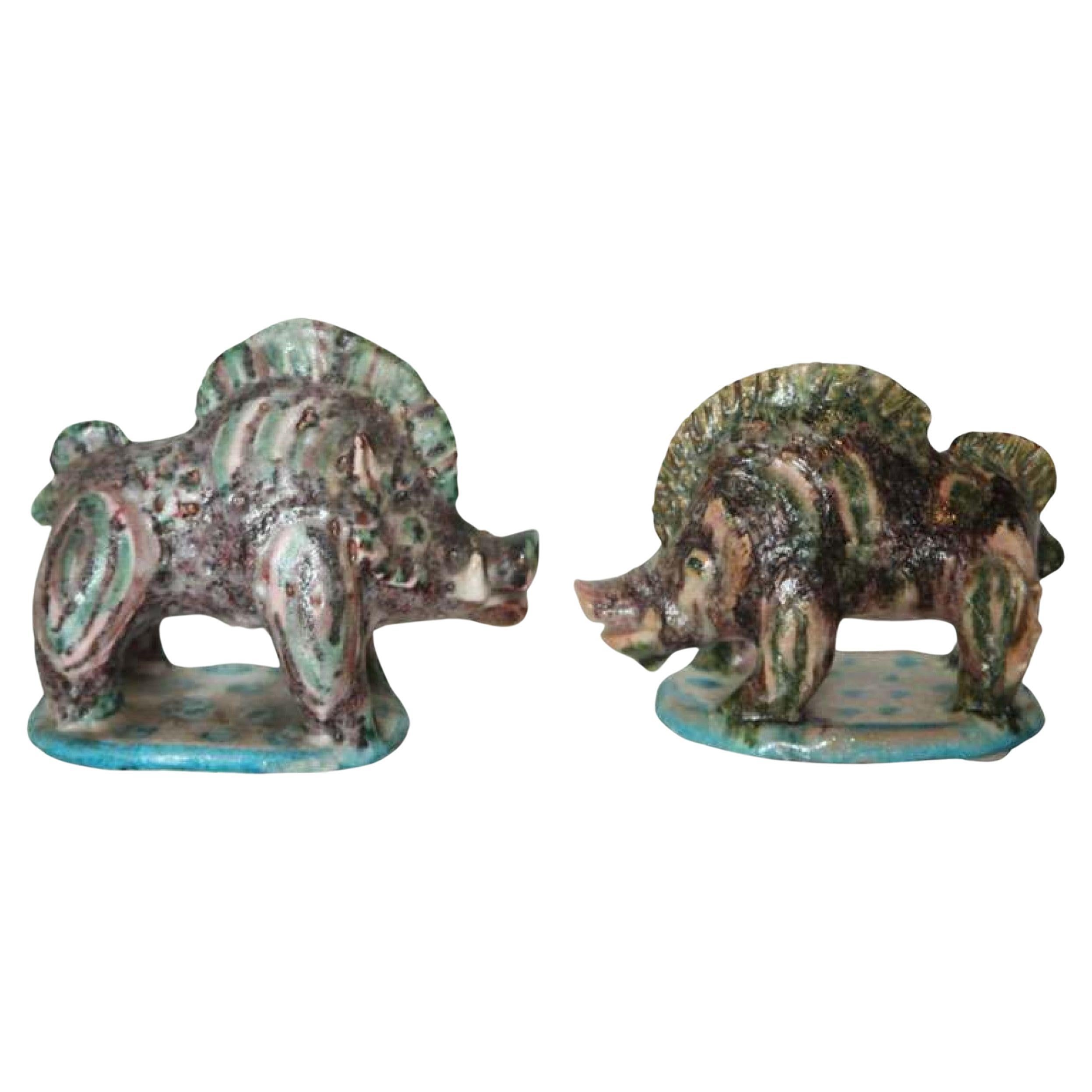 Coppia di cinghiali in ceramica di Gambone