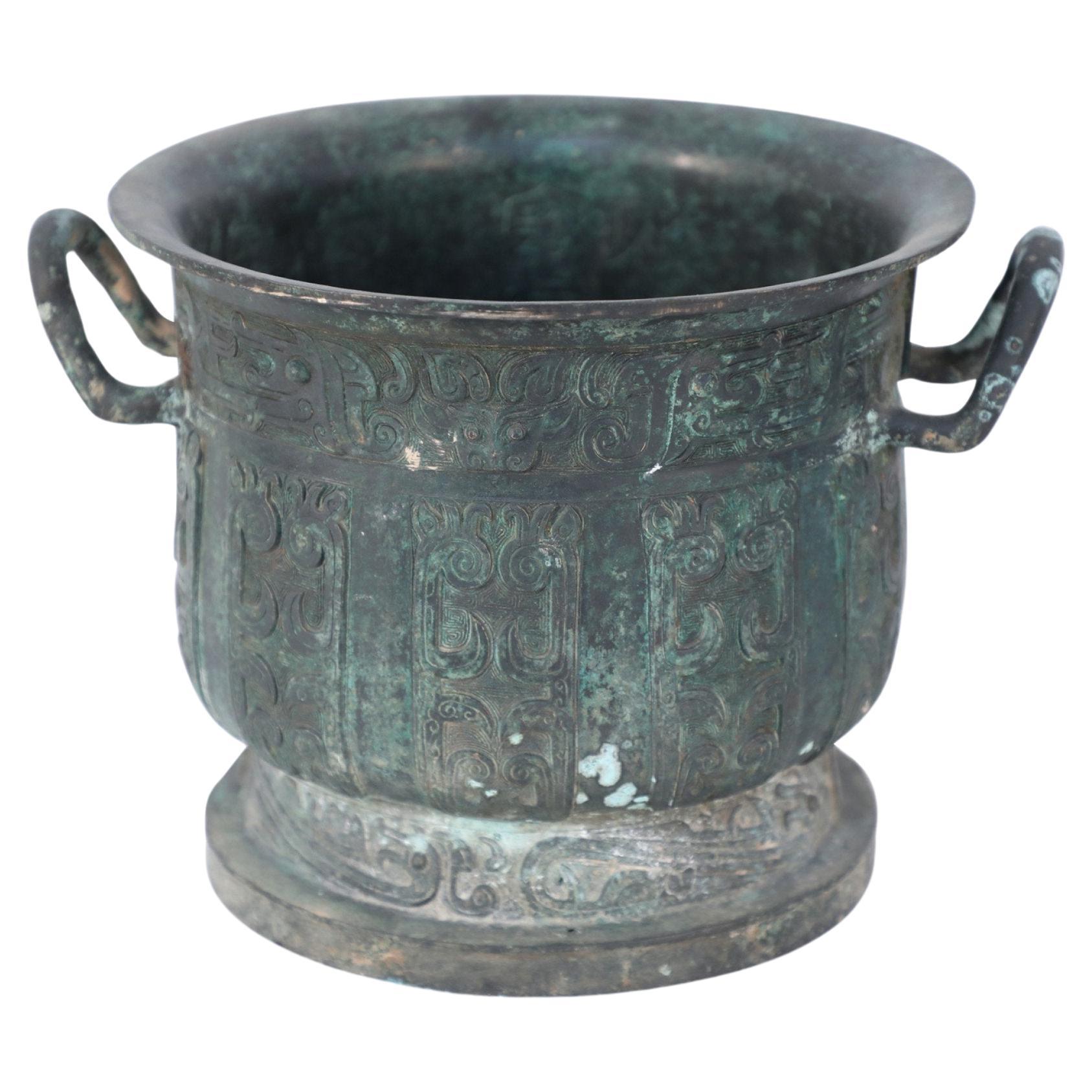 Antique Chinese Han Dynasty Patinated Bronze Urn with Geometric Design For Sale