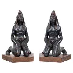 Pair of Egyptian Carved Ebonized Kneeling Figures