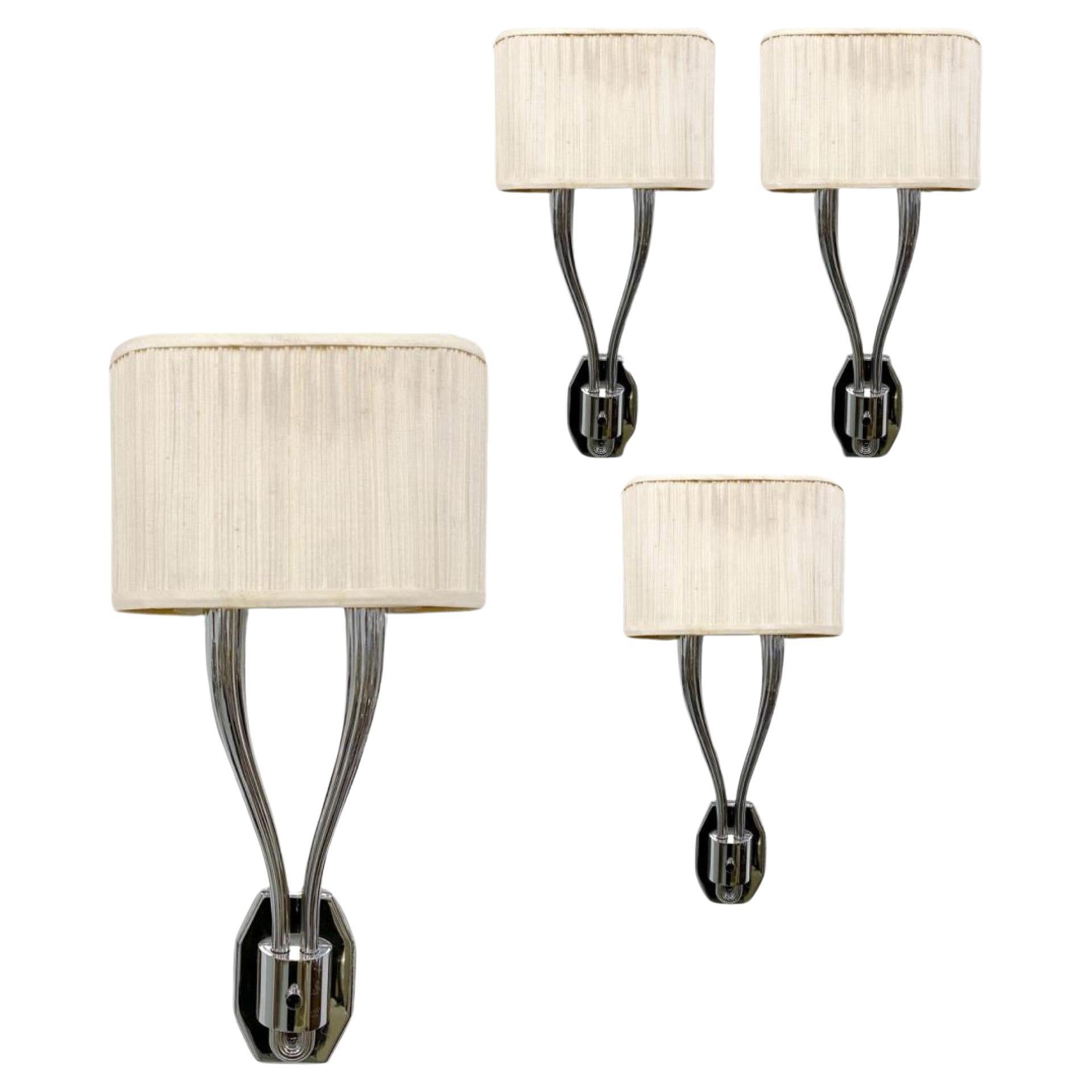 Ensemble de 8 appliques à deux lumières en nickel, à la manière de Ruhlman