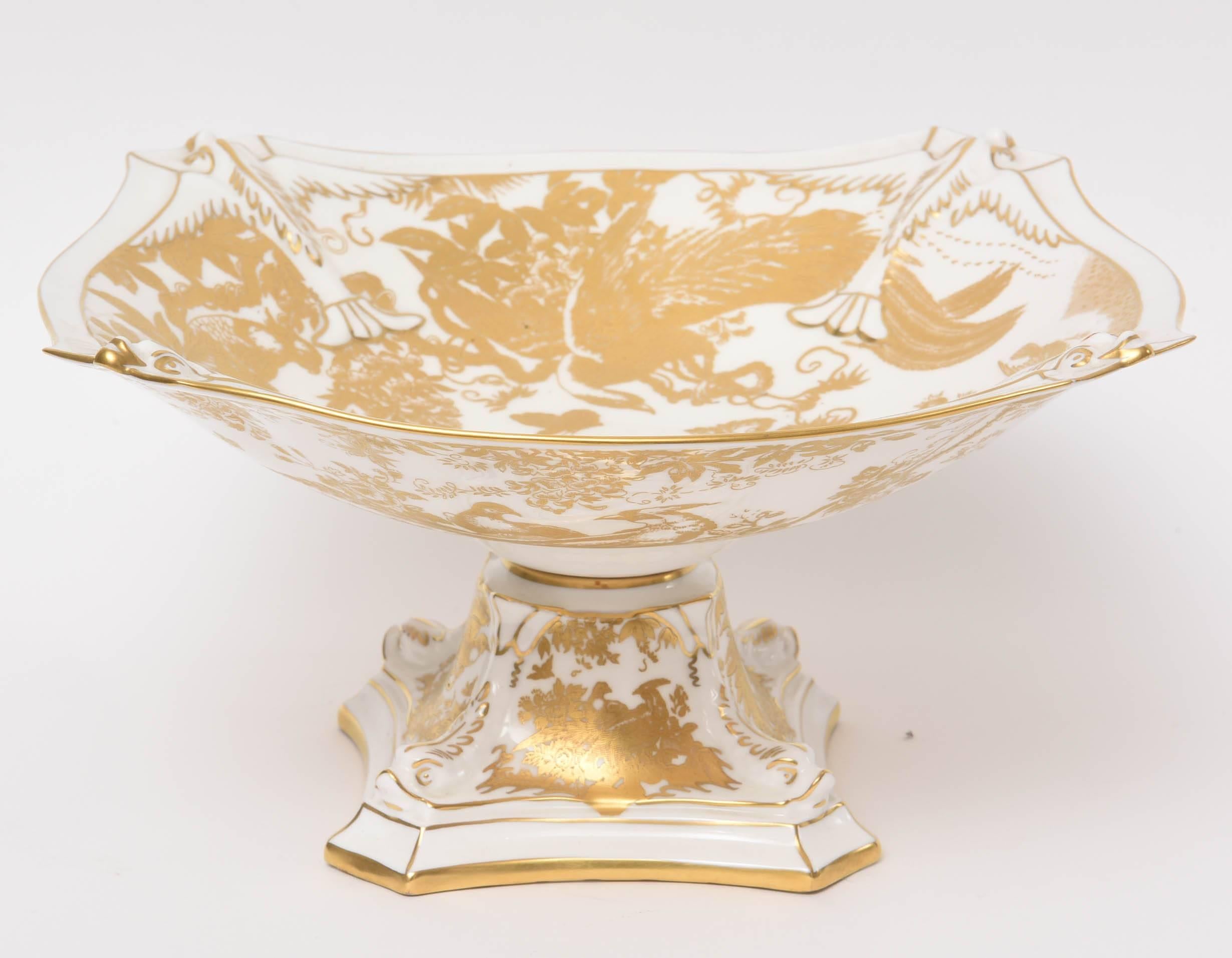 One of Royal Crown Derby's most elegant pattern. This lovely centerpiece features a square shape top, pedestal base and all over 24-karat gold in Derby's signature 