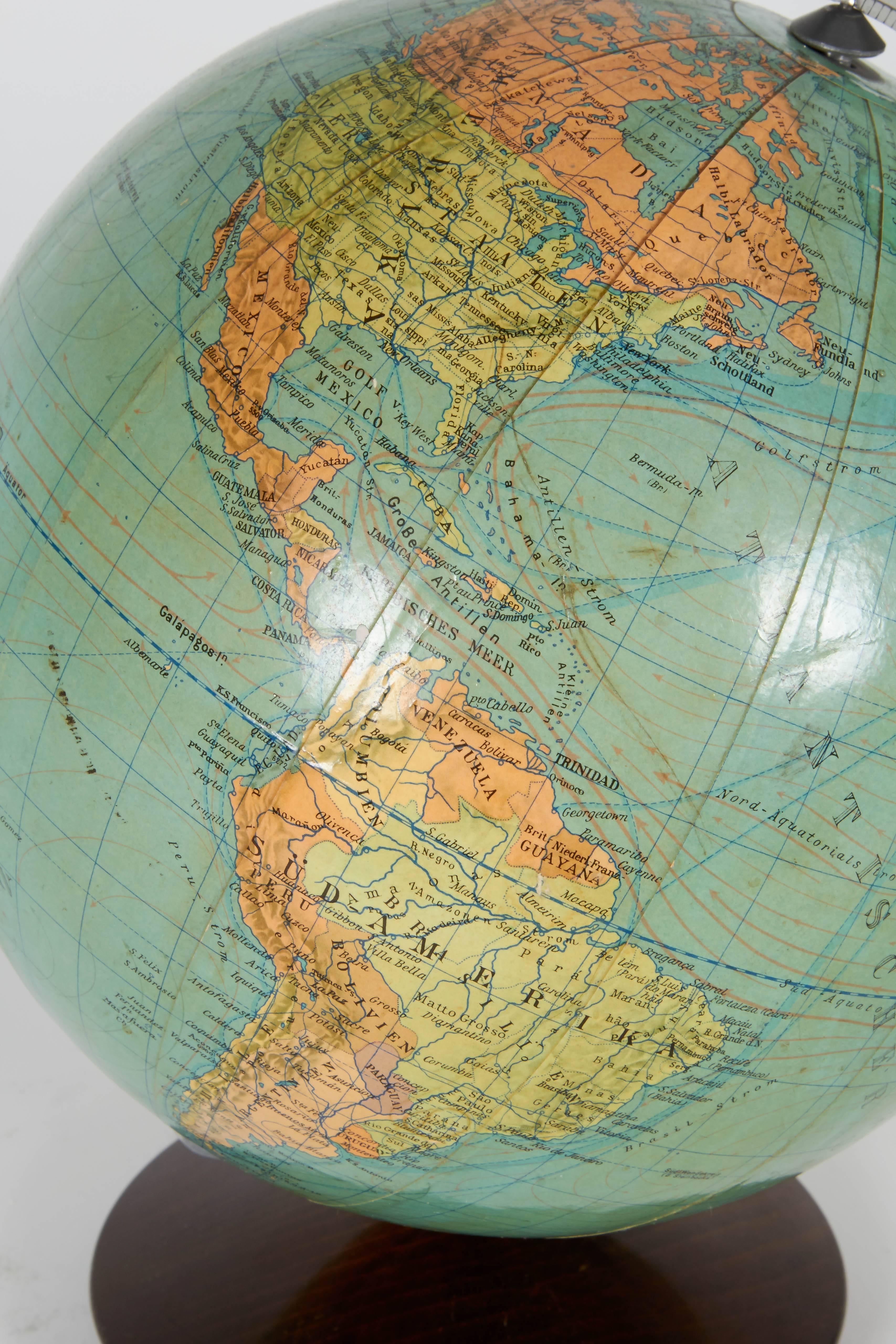 Vintage rotating globe on a stand. Perfect item for a study or any room of a travel enthusiast.