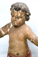 Carved and Polychromed Putti with Lamb