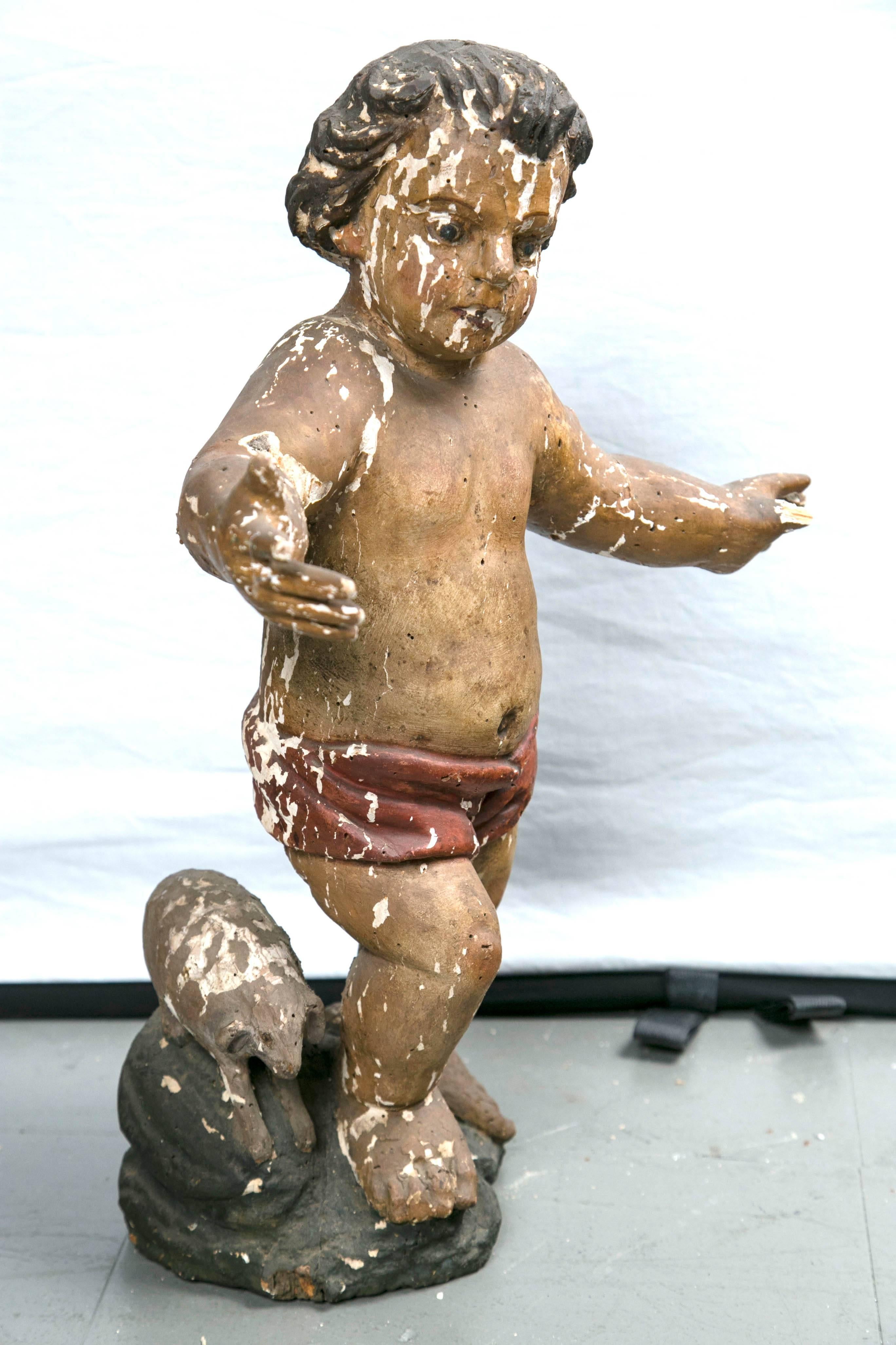 German Carved and Polychromed Putti with Lamb For Sale