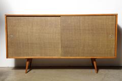 Paul McCobb Planner Group für Winchendon Ahorn und Grasscloth Credenza:: 1950er Jahre