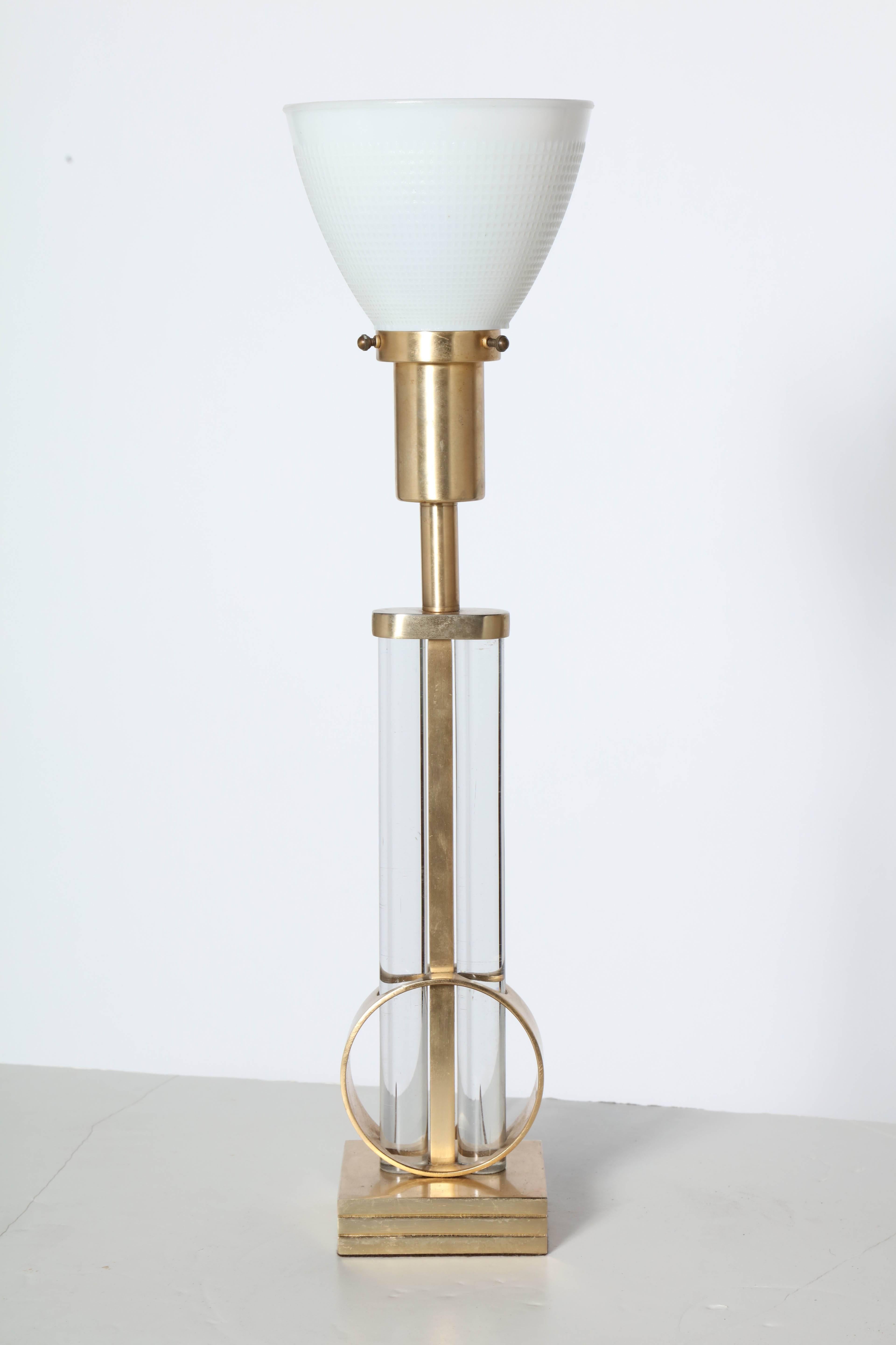 Gilbert Rohde for Mutual Sunset Lamp Company 4660 Glass and Brass Table Lamp with White Glass Shade. Featuring Brass vertical shaft, two transparent parallel Glass rods with White Milk Glass diffuser Shade (5H x 6W) and 4 inch square Brass base.