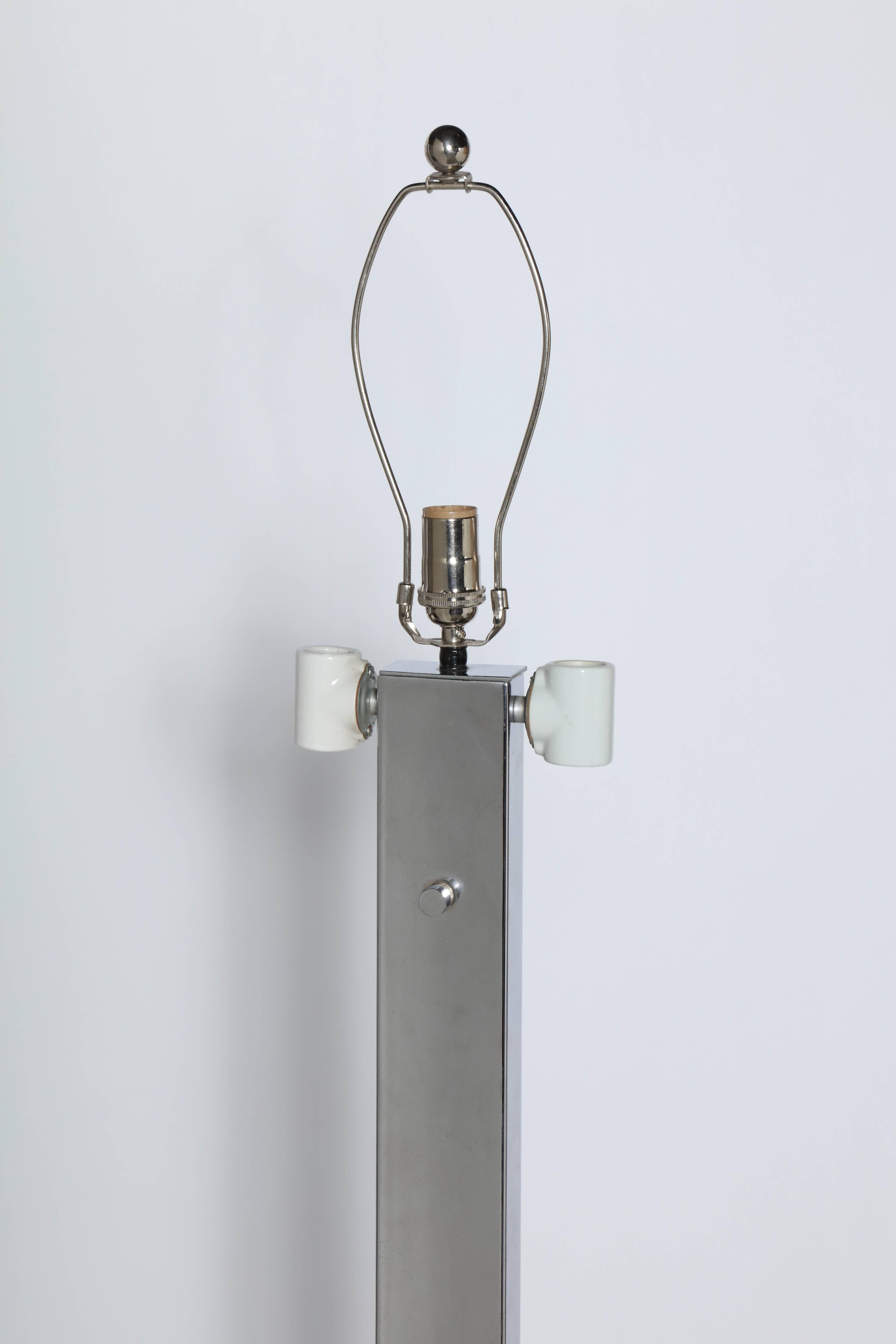 Tall and Modern George Kovacs Five Socket Chrome Reading Floor Lamp. Small footprint. Featuring a  Chromed Steel rectangular column with new Nickel plated top socket and 4 original Off-White ceramic side sockets (2 up and 2 down) on heavy balanced,