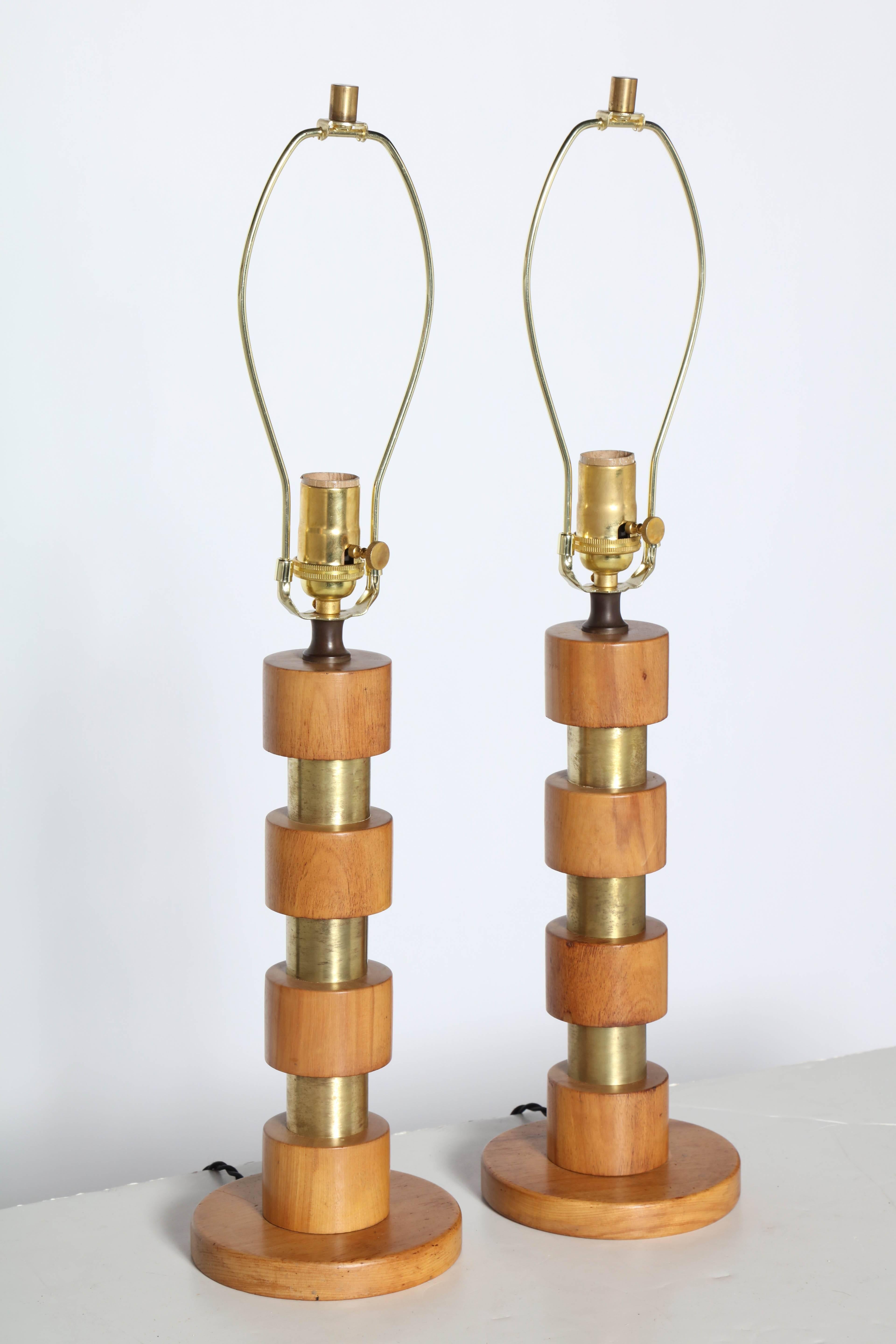 Pair of Brass and Maple Russel Wright Style Bedside Table Lamps, Desk Lamps. Featuring a central Brass column, round stacked Maple discs and round 6D Maple base. Sculptural. Industrial. Architectural. Dimensional. Warm. Natural. Study. Library.