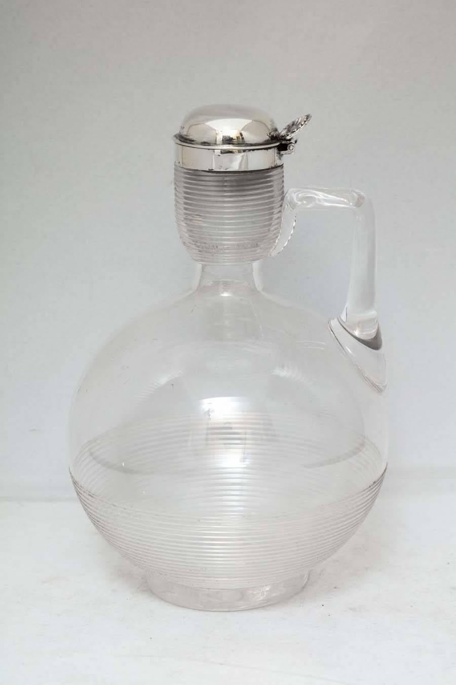 Unusual, Victorian, sterling silver-mounted, handblown, threaded glass claret jug, London, 1886, Edgar Finley & Hugh Taylor - makers. Measures: 7 1/2
