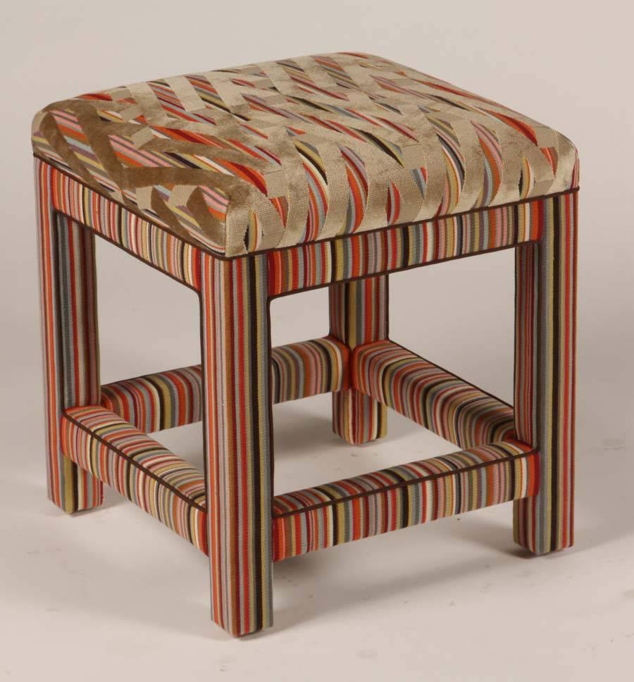 Wonderful pair of recently upholstered stools. Tops in Zoffany Harlequin cut velvet and beneath in a coordinating stripe. Elegant piping detail accentuates the simple, classic silhouette. 
These would make excellent occasional seating in an