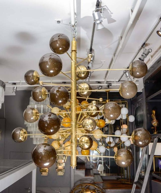 Brass Vertical Chandelier with Murano Glass Globes, Glustin Luminaires