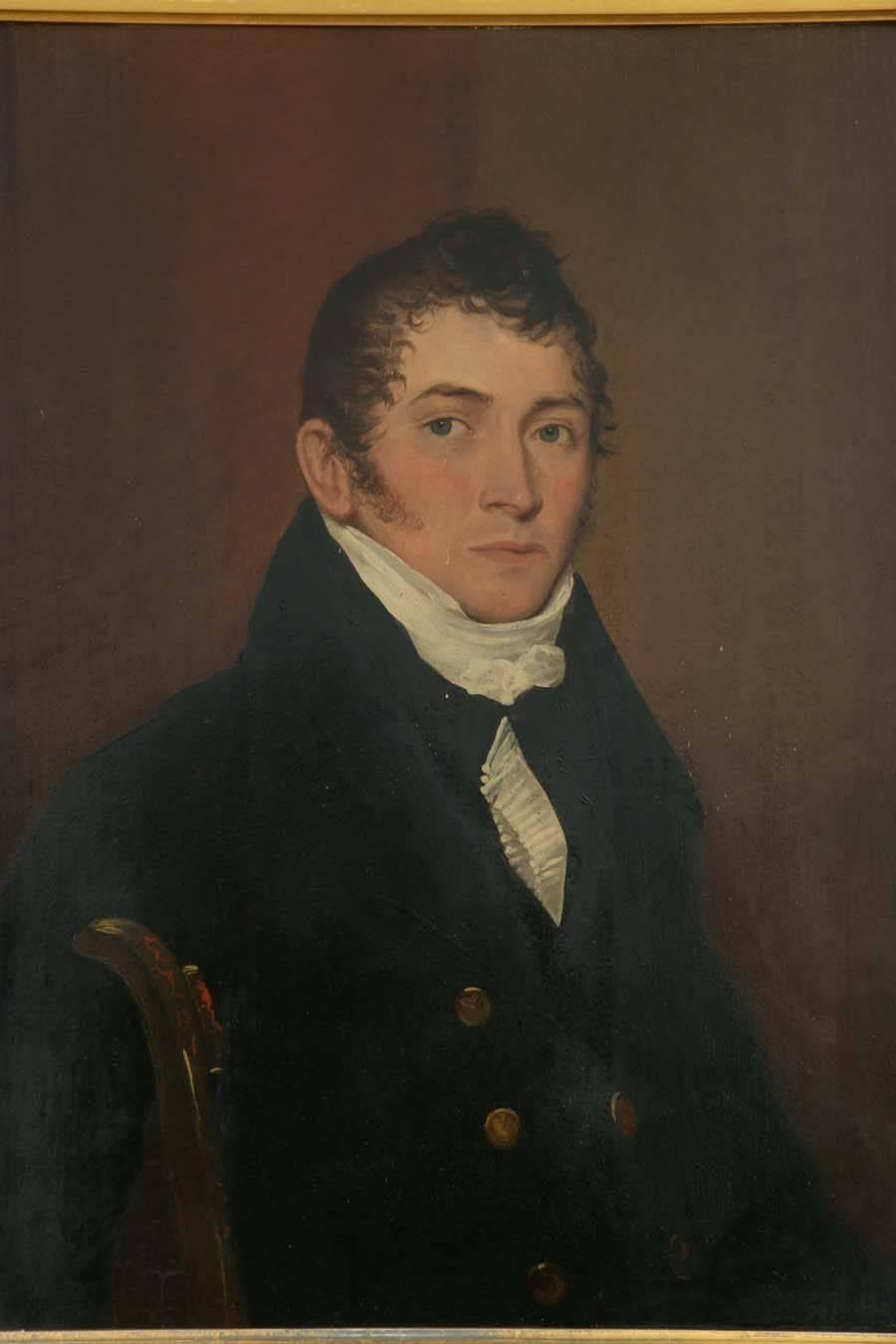 Portrait of a young sea captain seated in a “fancy chair” with double-breasted navy colored pea coat adorned with gold buttons.

Oil on board.

American, circa 1835.

33” H x 37” W.
 