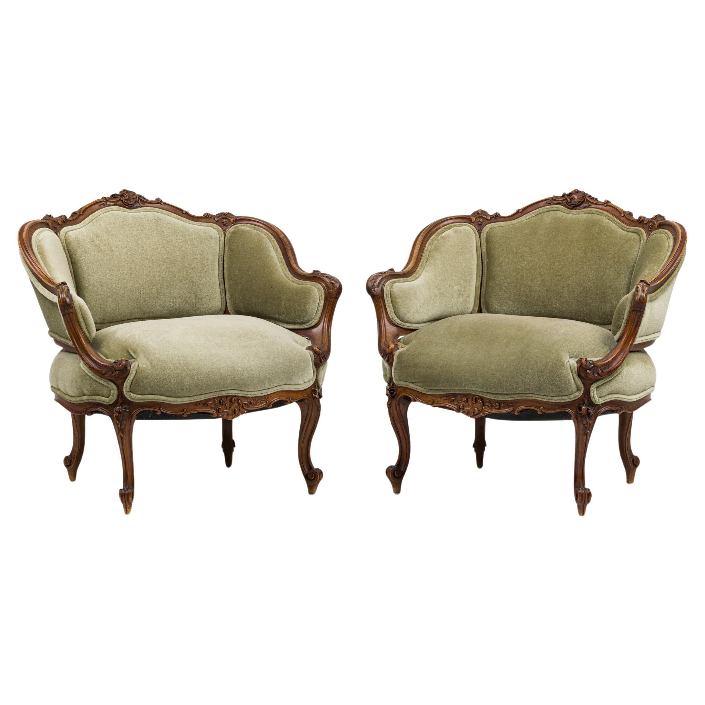 Pair of French Louis XV Style Carved Walnut Low Back Armchairs