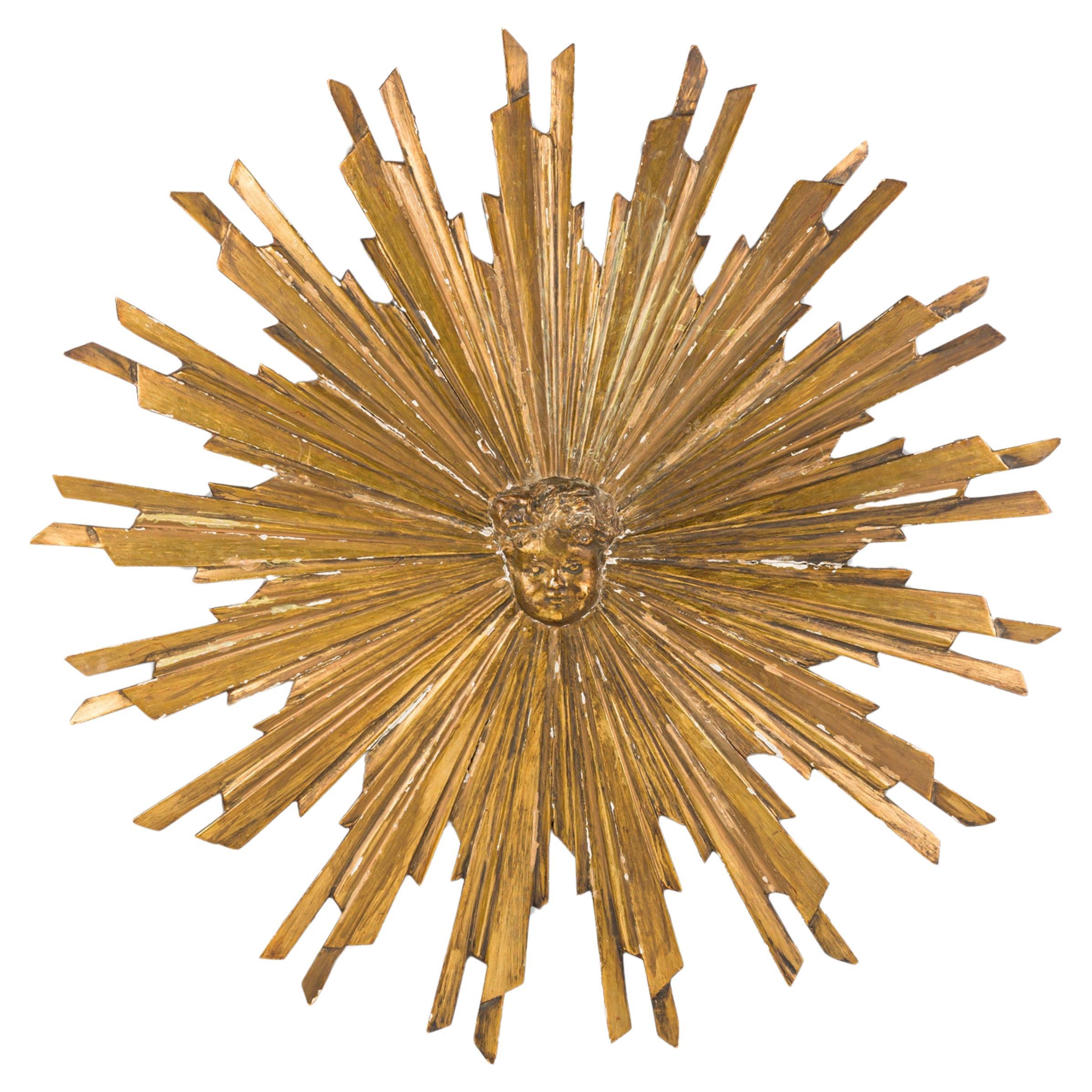 Italian Neoclassical-Style Carved Giltwood Sunburst and Putti Wall Plaque