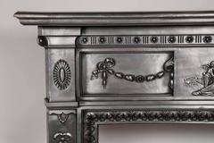 Antique Neoclassical Polished Cast Iron Fireplace Surround