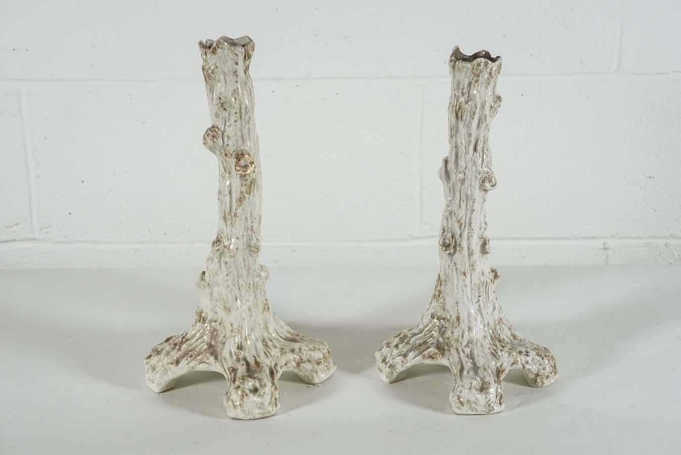 Here is a beautiful pair of Sitzendorf faux bois porcelain candlesticks with a gold wash finish.