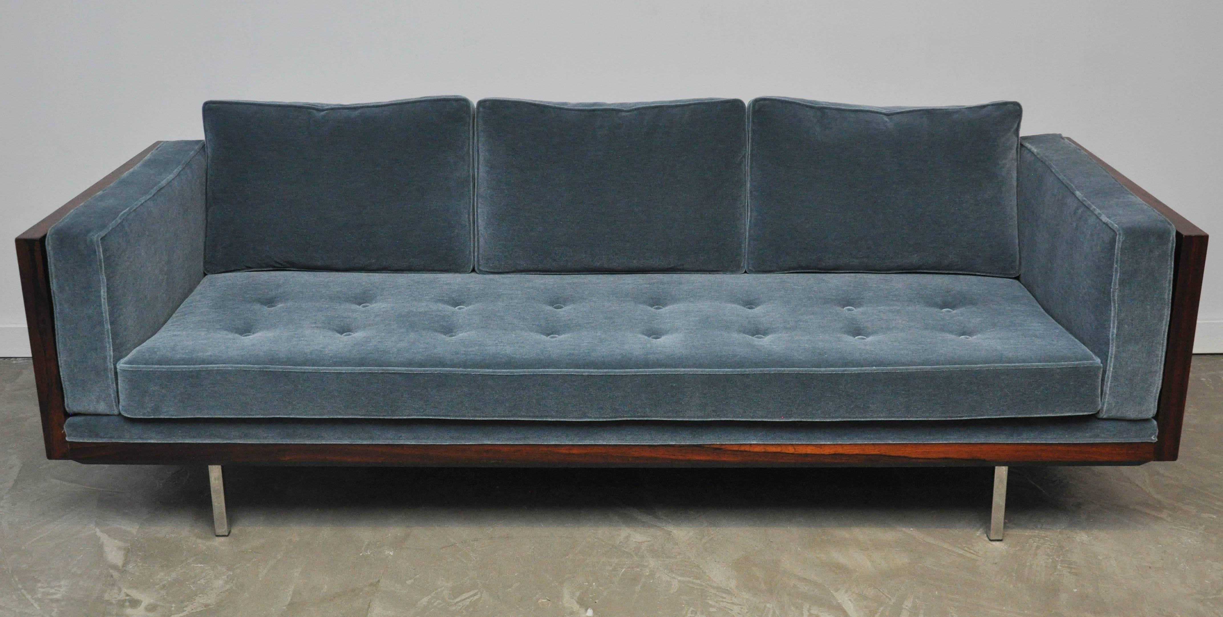 Pair of rosewood case sofas by Milo Baughman. Beautiful rosewood grain. Fully restored cases. Reupholstered in mohair.