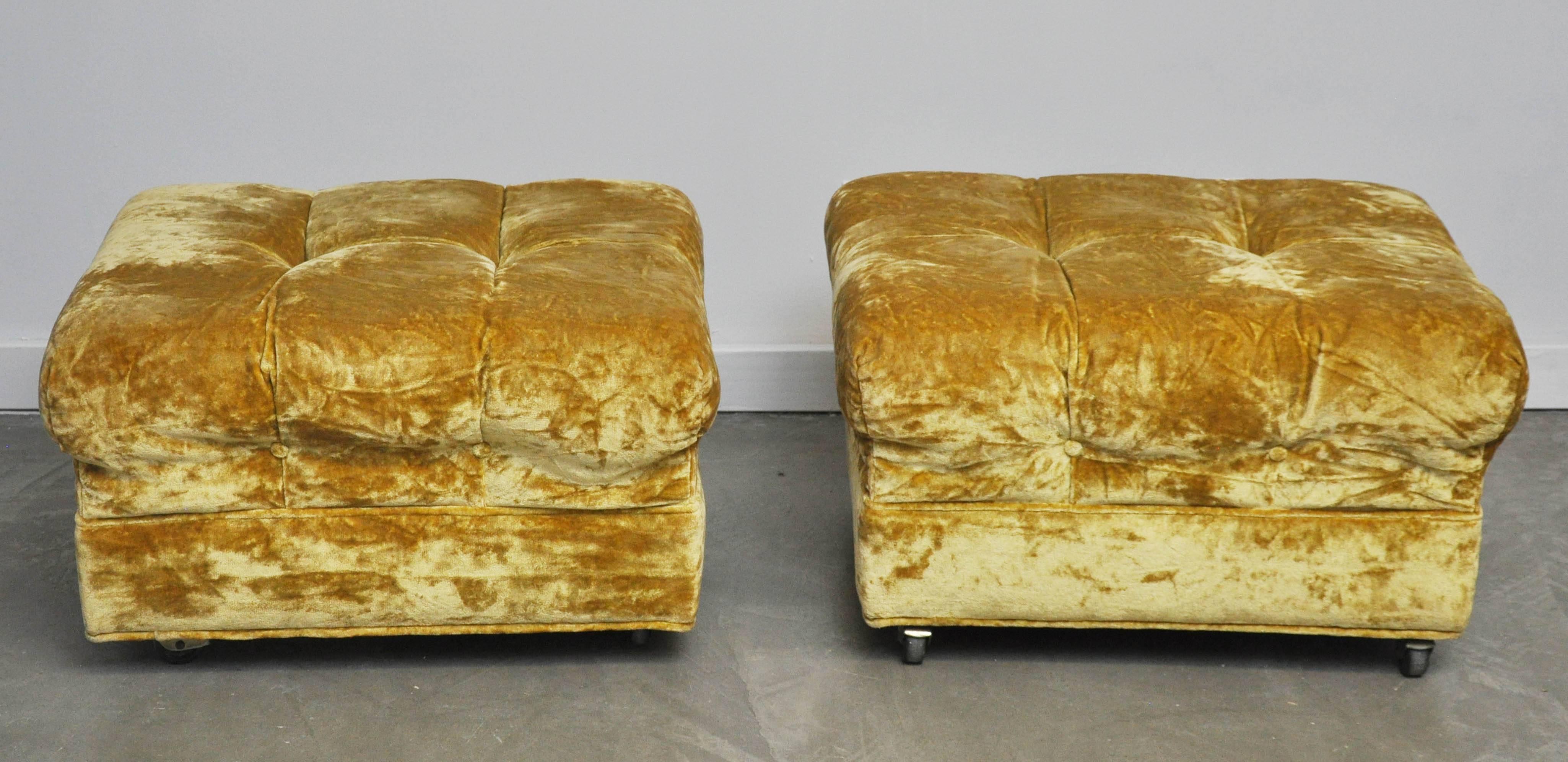Pair of tufted rolling ottomans by Edward Wormley for Dunbar. These were designed to go with the Edward Wormley 