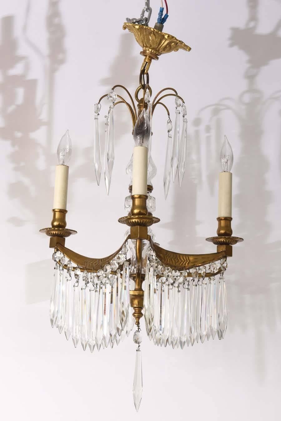 This stylish Gustavian, Louis XVI style chandelier was recently purchased from a Palm Beach estate. 

